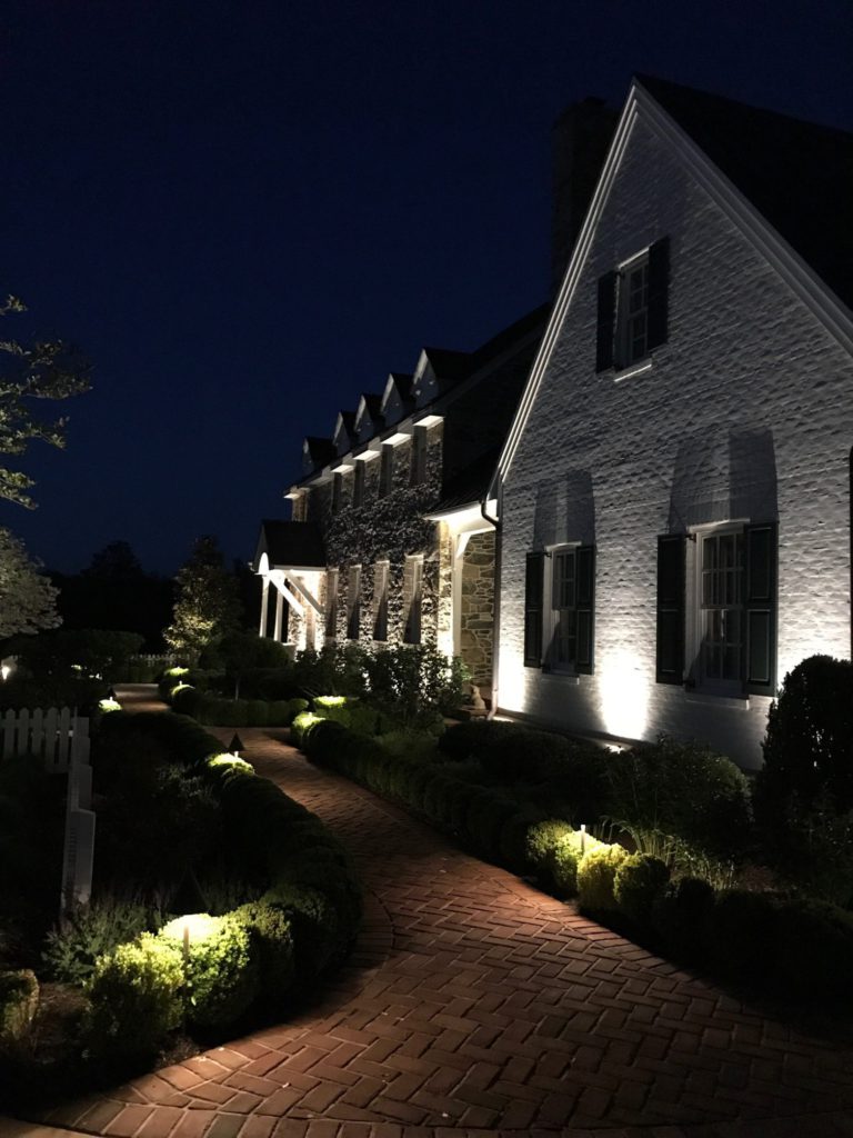 lights on home front garden and house