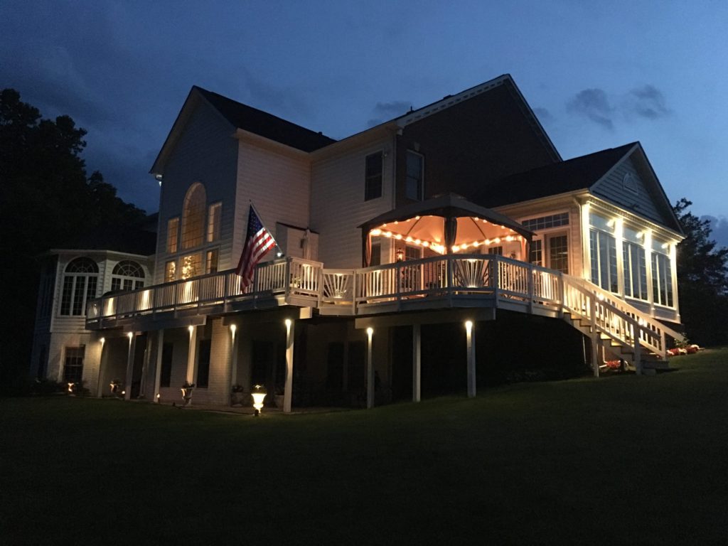 lights on house in back yard deck