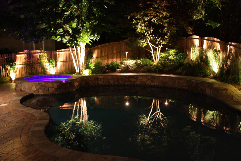 lights around reflective pool