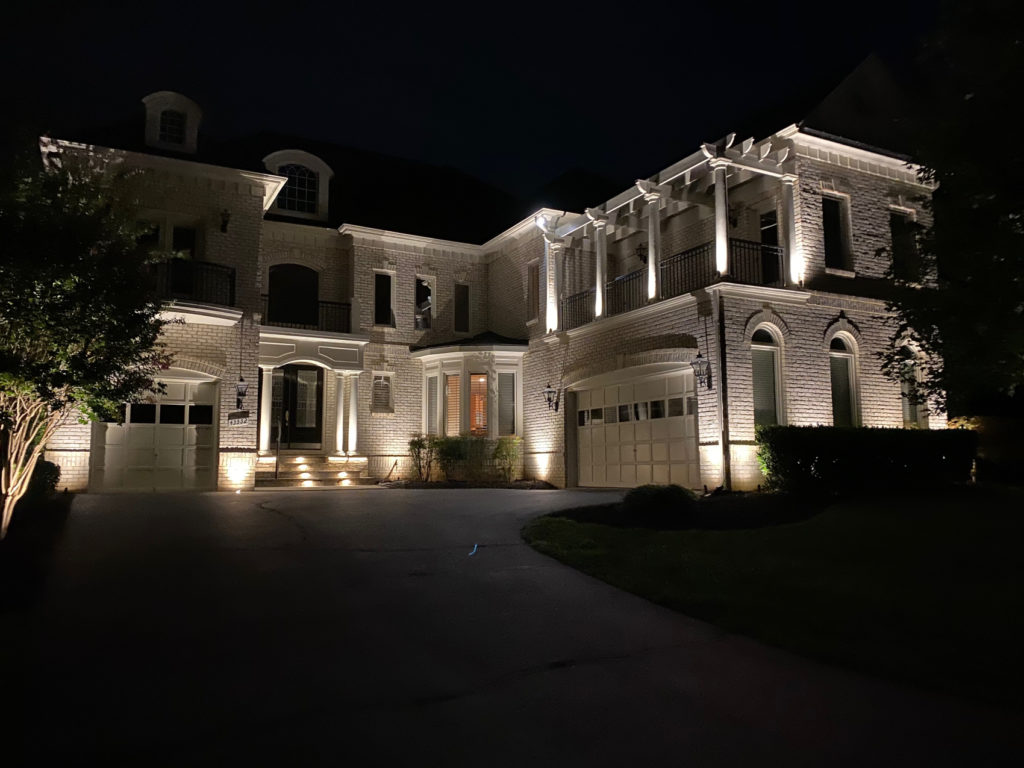 lights at front of large house